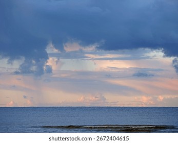 Dramatic sunset cloudscape - Moody evening sky over the sea