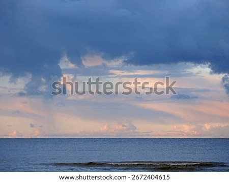 Dramatic sunset cloudscape - Moody evening sky over the sea