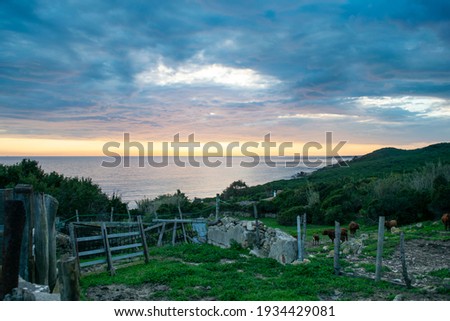 Dramatic sunset cloudy sky over Andalusian Atlantic coast of Tarifa in Punta Paloma
