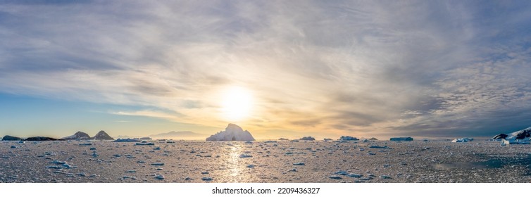 dramatic sunset  evening atmosphere in Cierva Cove - a deep inlet on the west side of the Antarctic Peninsula, surrounded by Cierva Bay in San Martín Land - Antarctica - Shutterstock ID 2209436327