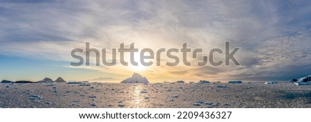 dramatic sunset  evening atmosphere in Cierva Cove - a deep inlet on the west side of the Antarctic Peninsula, surrounded by Cierva Bay in San Martín Land - Antarctica