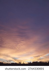 Dramatic sunset glowing horizon and expressing mood, emotion, and reflection.