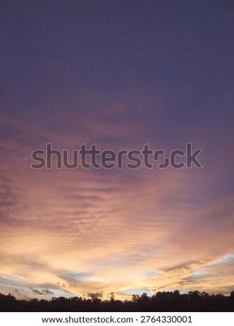 Dramatic sunset glowing horizon and expressing mood, emotion, and reflection.