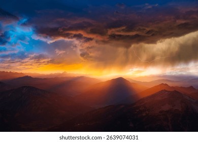 A dramatic sunset landscape featuring dark storm clouds, distant mountains, and a burst of lightning illuminating the sky.
