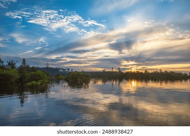 Dramatic Sunset on Sam Rayburn Reservoir located in South Eastern Texas during summer.