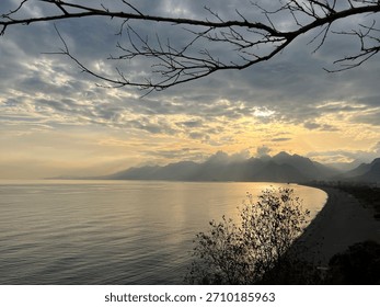 Dramatic Sunset Over Konyaaltı Beach and the Taurus Mountains, Antalya, Turkey