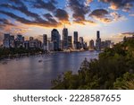 Dramatic sunset over Brisbane skyline and Brisbane river from Kangaroo Point Cliffs, Queensland, Australia.