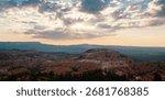 Dramatic sunset over Bryce Canyon highlighting its rugged beauty and grandeur.
