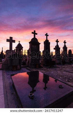 Dramatic sunset over the crosses, Llucmajor Cemetery, Mallorca, Balearic Islands, Spain