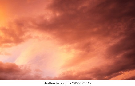 Dramatic sunset over a dark landscape with fiery clouds, atmosph