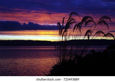 Dramatic Sunset Over The Kilbrannan Sound. Taken From Catacol On The Isle Of Arran. Scotland.