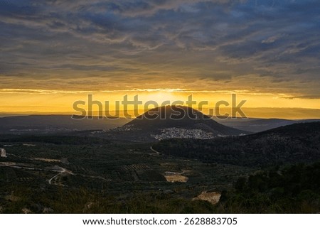 Dramatic Sunset Over Mount Tabor in Lower Galilee, Israel