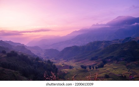Dramatic sunset over mountain landscape. Beautiful landscape foggy hills twilight time. Blue golden sky sunrise dramatic beautiful landscape mountain. Dawn sky gold dusk time cloudscape with sunlight - Shutterstock ID 2200613339