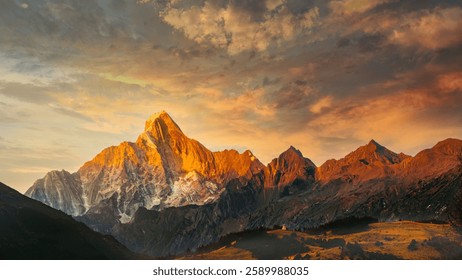Dramatic sunset over mountain range silhouette