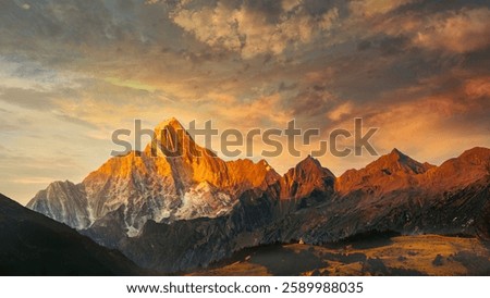 Dramatic sunset over mountain range silhouette