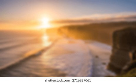 Dramatic sunset over ocean cliffs with golden light with scenic coastal view.