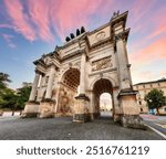 Dramatic sunset over Siegestor - Victory Gate  arch in downtown Munich, Germany 