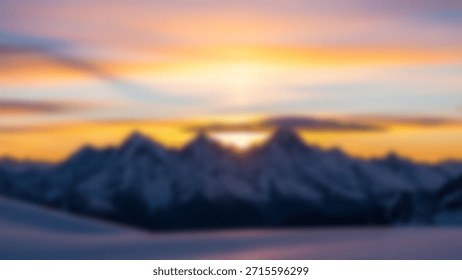 Dramatic Sunset Over SnowCapped Mountains with Golden Sky, Wilderness Beauty, and Landscape.