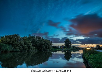 Dramatic sunset and reflections. Long exposure photography