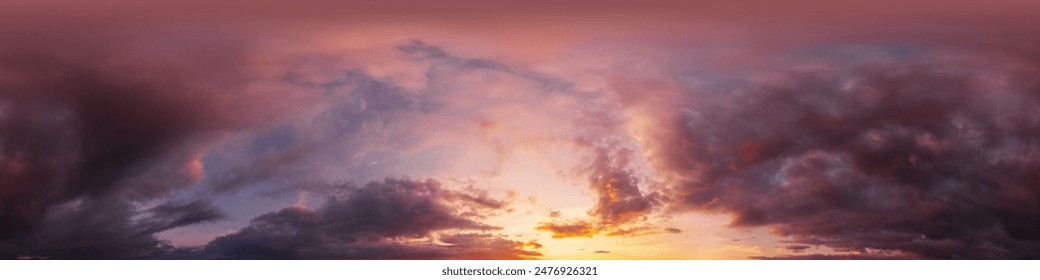 Dramatic Sunset sky 360 panorama. Vibrant sky panorama with bright glowing red pink Cumulus clouds. HDR 360 seamless spherical panorama. Sky dome for aerial drone panoramas. Climate and weather change