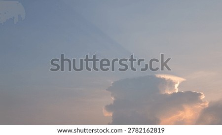 Dramatic sunset sky with crepuscular rays and pileus cloud over cumulonimbus, golden hour nature background with copy space