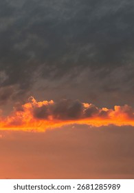 Dramatic sunset sky with glowing clouds