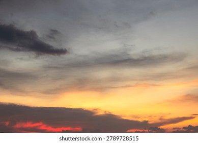 Dramatic Sunset Sky With Orange And Gray Clouds