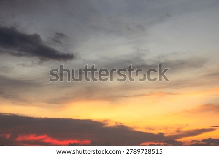Dramatic Sunset Sky With Orange And Gray Clouds