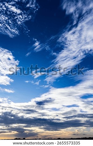 Dramatic sunset in the Sky through cumulus storm clouds,. Awesome epic landscape. Amazing vibrant colors, in Brazil
