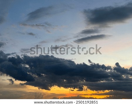 Dramatic sunset sky view with overcast for background. Dusk beam light cover cloudy. Dawn sky. Vanilla sky view.