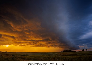 Dramatic sunset thunderstorm sky over an open field - Powered by Shutterstock