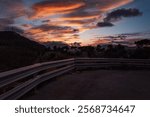 Dramatic sunset 🌅 views from Monte Pellegrino’s Belvedere in Palermo, capturing the rugged Mediterranean coastline against a canvas of golden-orange clouds.