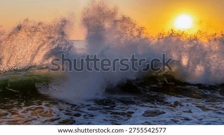 Dramatic sunset waves with golden backlit sea spray
Dramatic ocean waves crashing at sunset with golden backlit sea spray and glowing water in a dynamic seascape.