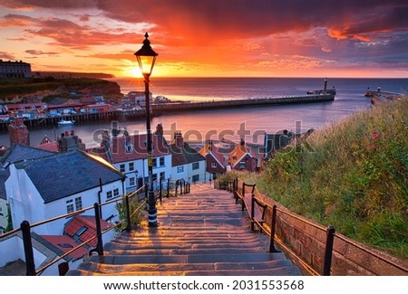 Dramatic Sunset at Whitby after a shower on a Summer Evening. North Yorkshire, England, UK.