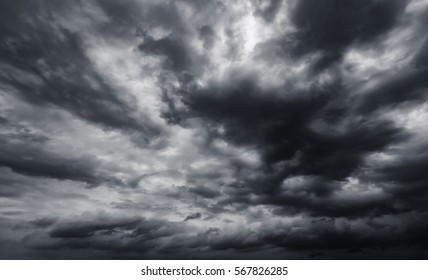 Dramatic thunderstorm clouds background at dark sky - Shutterstock ID 567826285