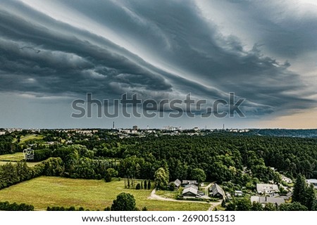 Dramatic thunderstorm clouds over city