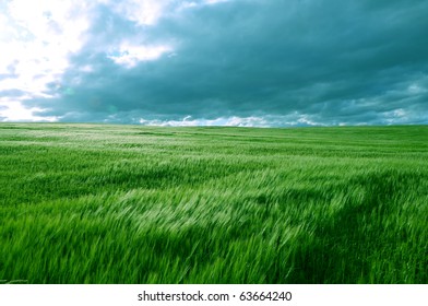 Dramatic thunderstorm clouds over farm field
