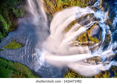 Dramatic top view of waterfall peak, Iceland. Iceland is famous for pure, dramatic and rough nature.