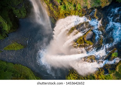 Dramatic top view of waterfall peak.