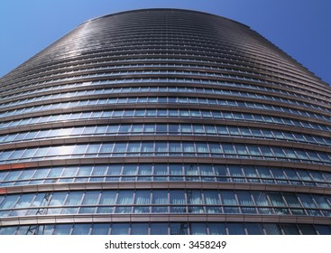 dramatic upward view of a modern office block