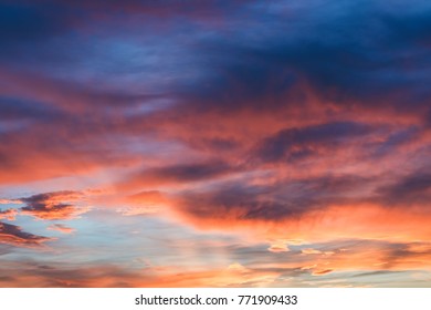 dramatic vibrant colorful clouds during sunset