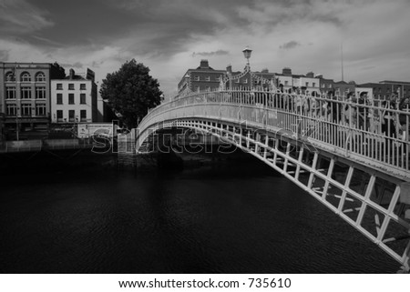 A dramatic view of Ha'Penny Bridge, Dublin, Ireland in Monochrome