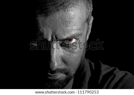 Dramatic view of a man face in darkness
