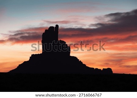 Dramatic view of the Monument Valley's magnificent butte and mittens lit up during a sunset.
Iconic butte, spire and mitten formations used as a backdrop in many old western movies. Navajo,Arizona.