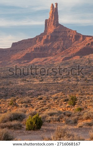 Dramatic view of the Monument Valley's magnificent butte and mittens lit up during a sunset.
Iconic butte, spire and mitten formations used as a backdrop in many old western movies. Navajo, Arizona, USA