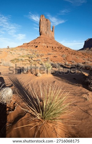 Dramatic view of the Monument Valley's magnificent butte and mittens lit up during a sunset.
Iconic butte, spire and mitten formations used as a backdrop in many old western movies. Navajo, Arizona, USA