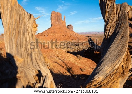 Dramatic view of the Monument Valley's magnificent butte and mittens lit up during a sunset.
Iconic butte, spire and mitten formations used as a backdrop in many old western movies. Navajo, Arizona, USA