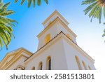 Dramatic view of palm trees surrounding the First Church of Christ, Scientist in Riverside, California.