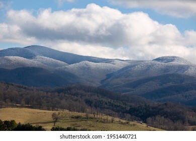 Dramatic View Of Snow Covered Appalachian Mountains Under Blue Sky In Virginia.