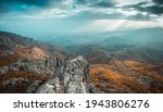 Dramatic View of Stone Hills and Beautiful Sunlight at the Background. Autumn View of Blue Rock in Sliven Bulgaria at Sunset Sky